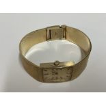 A gents 14ct yellow gold wristwatch. Approx 58.8g.