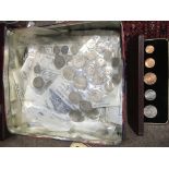 A tin of coins including pre 1947 shillings etc.