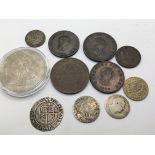 A collection of coins including a 1580 Elizabeth I