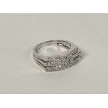 A 14ct White Gold Diamond set ring, size N.