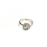 White gold ladies diamond cluster ring. Size J and