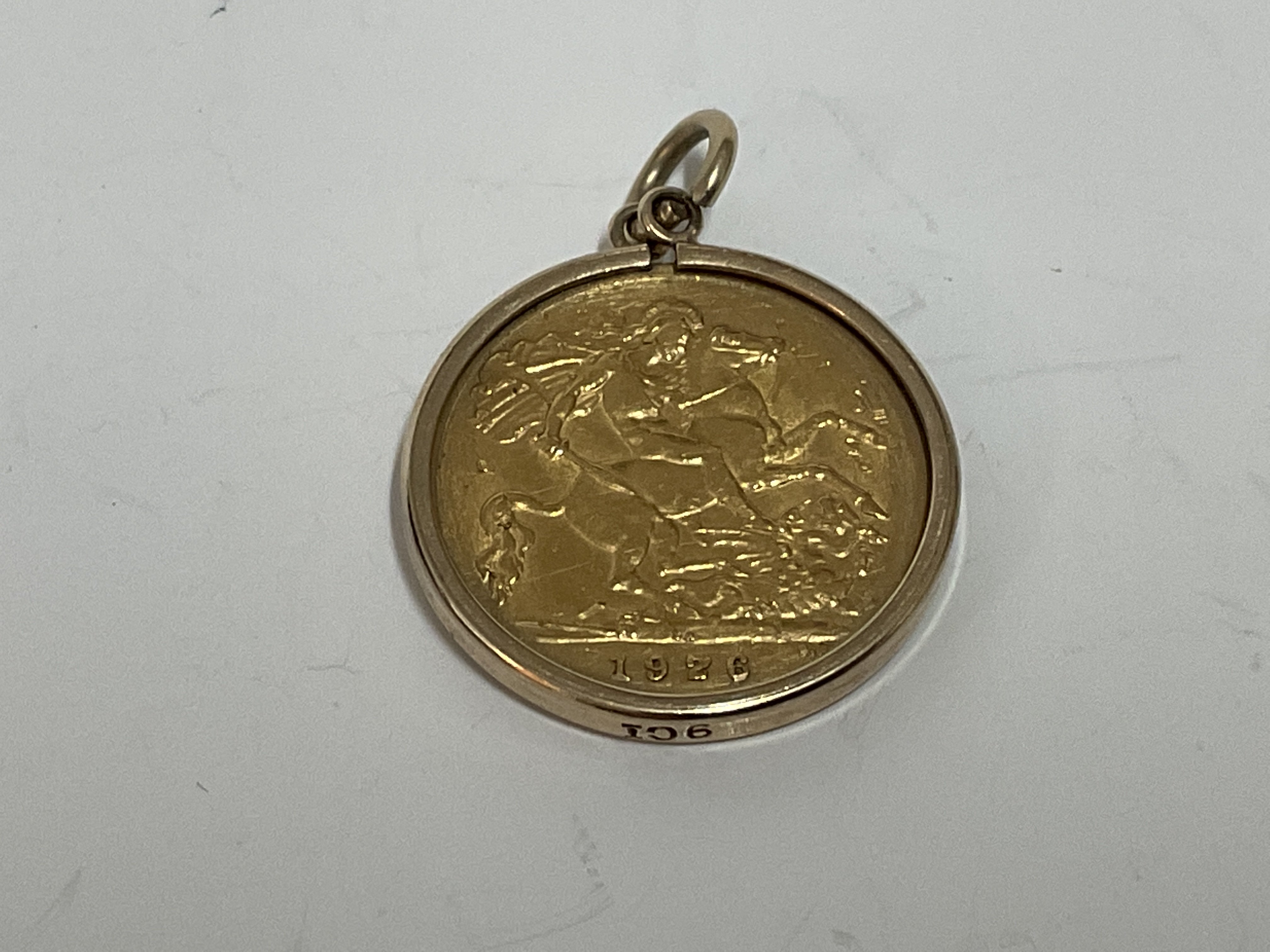 A 1926 South African int half sovereign with mount. - Image 2 of 4