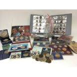 A collection of commemorative coins some silver an
