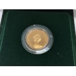 A 1980 full proof Royal mint sovereign.