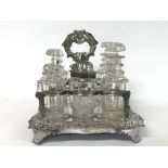 A George VI 1824 cruet with plated frame, some sli