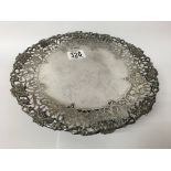 A hallmarked silver cake stand with pierced folate