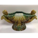 A Majolica style centrepiece in the form of a larg