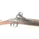 A late 18th or early 19th century flintlock lock m
