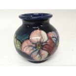 A Moorcroft bulbous shaped vase decorated with Ane