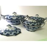 Three late Victorian blue and white tureens and a