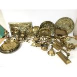 Brass ornaments including plaques, plates and bell