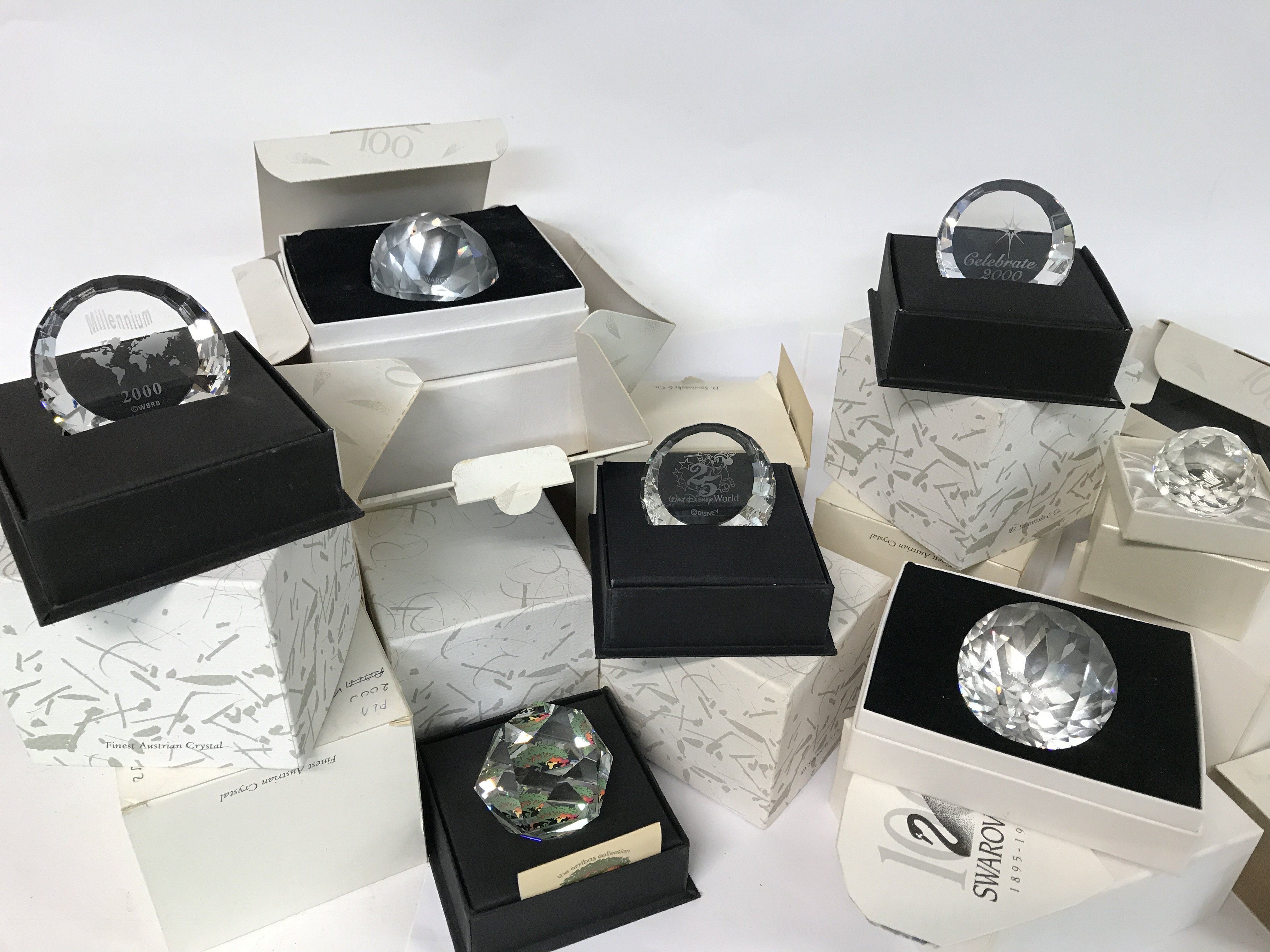 A collection of boxed Swarovski including commemor