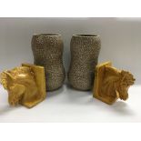 A pair of mottled vases, approx height and a pair