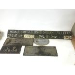 Five cast iron crane and train signs