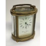 A brass cased carriage clock by Charles Frodsham o