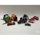 A small collection of die cast model trucks and ca