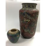 A Chinese cloisonne vase decorated with flowers an