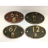 Four cast iron train plaques.