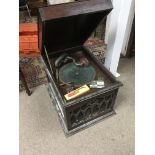 An oak cased gramophone.