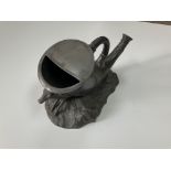 A Victorian pewter spoon warmer in the form of a h