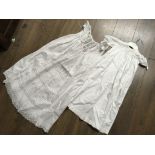 An Edwardian christening gown with lace trimmings