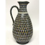 A Lambeth Doulton jug, damaged