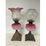 Oil lamps with cranberry tinted shades