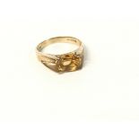 9ct gold ring set with citrine size N and 3.10g.