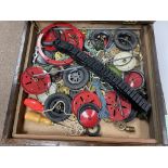 A box of mixed Meccano parts.