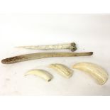 Sperm Whale teeth, A cassowary bone dagger- East S