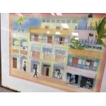 A framed watercolour street scene signed in pencil