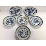 A collection of blue and white Canton dishes, larg