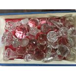 A box of mixed glass decanter stoppers.