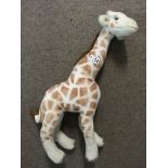 A Merrythought soft toy giraffe