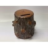 A Leigh pottery money box in the form of a tree tr