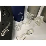 Five boxed Swarovski pieces including Violin, Saxo