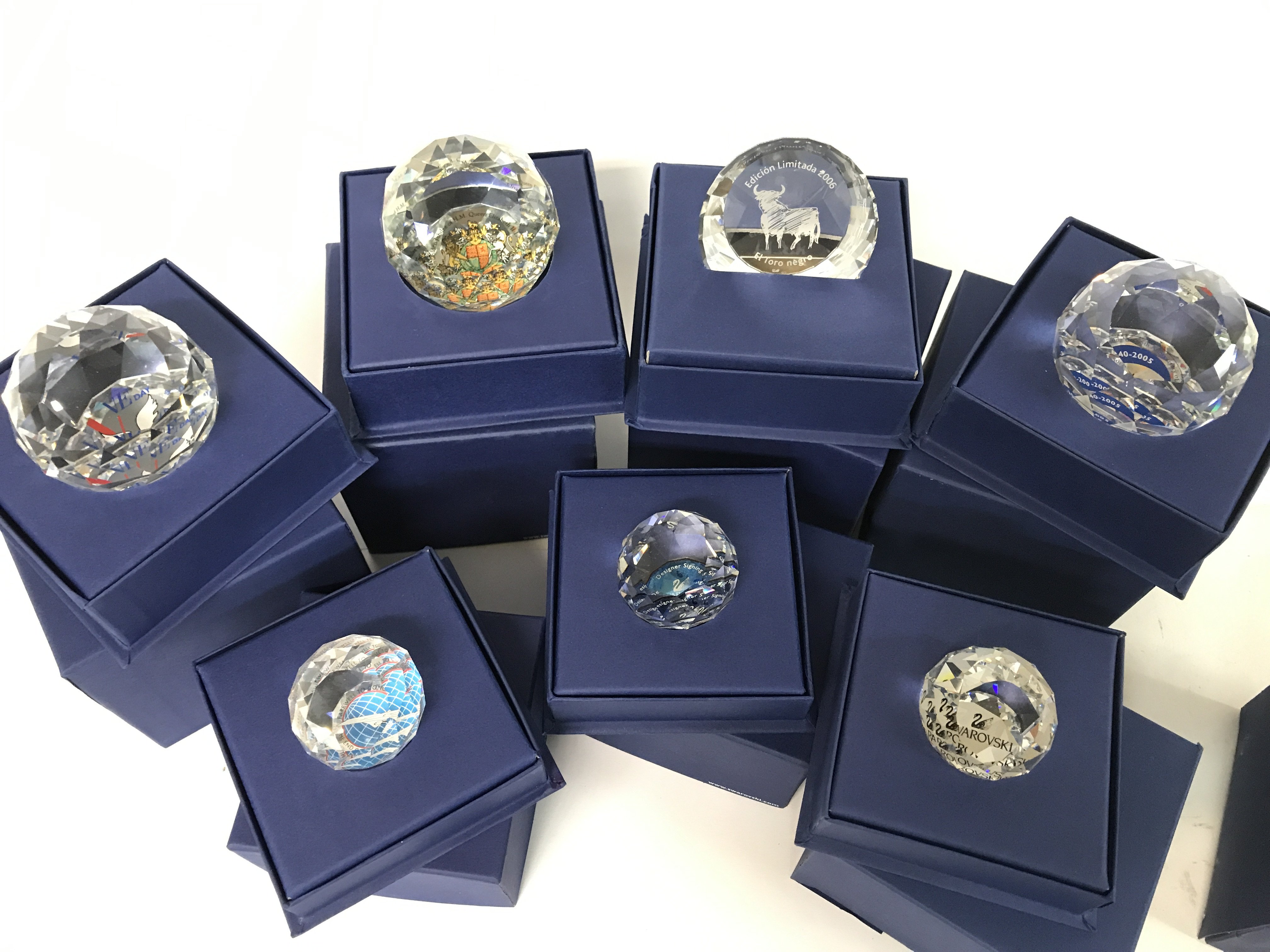 A collection of boxed Swarovski including VE Day p