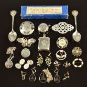 A collection of silver jewellery including vesta, sovereign holder, brooch, filigree brooch,