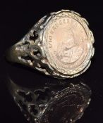 A 9ct gold ring set with a 1986 1/10 Krugerrand, 6.5g, size Q