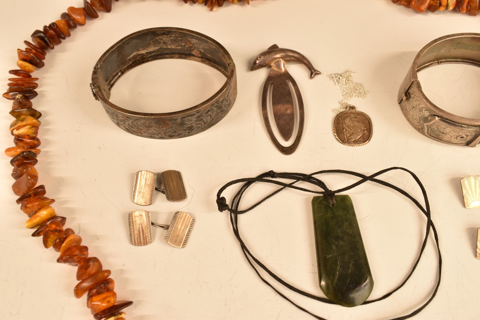 A group of silver items including two bangles, bookmarks and cufflinks, a nephrite jade pendant - Image 2 of 4