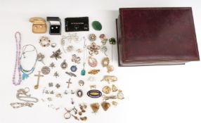A collection of silver jewellery including bracelet, fob, crosses, filigree, marcasite set rings,