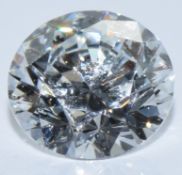 A loose 0.51ct faint blue round cut diamond, with GIA certificate