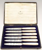 Cased Edward VII hallmarked silver bladed mother of pearl handled knife set, Sheffield 1909, maker