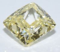 A loose 0.32ct natural yellow rectangular cut diamond, with GIA certificate