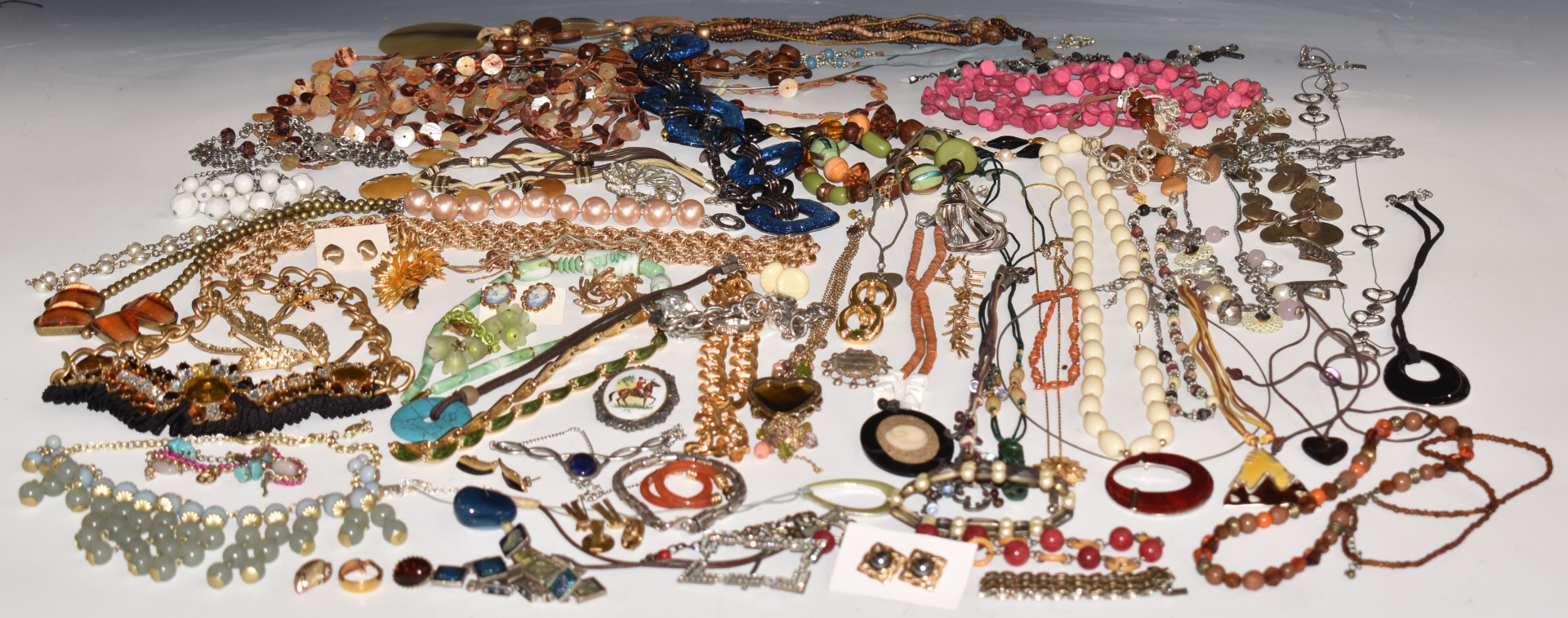 A collection of named costume jewellery including Avon, Napier, Sarah Coventry, Monet, Hollywood,