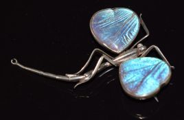 Victorian silver brooch in the form of a dragonfly set with butterfly wing, 6 x 5cm