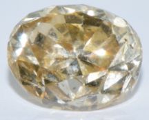A loose 0.88ct yellow/ brown/ orange oval cut diamond, with IGL certificate