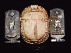 Egyptian silver brooch set with a scarab beetle, 4 x 2.5cm