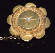 Victorian yellow metal mourning brooch set with an old cut diamond to the centre, verso a locket