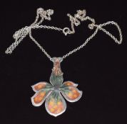 Norman Grant silver pendant in the form of an orchid set with enamel, 4.7 x 3.5cm